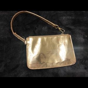 Michael Kors gold wristlet